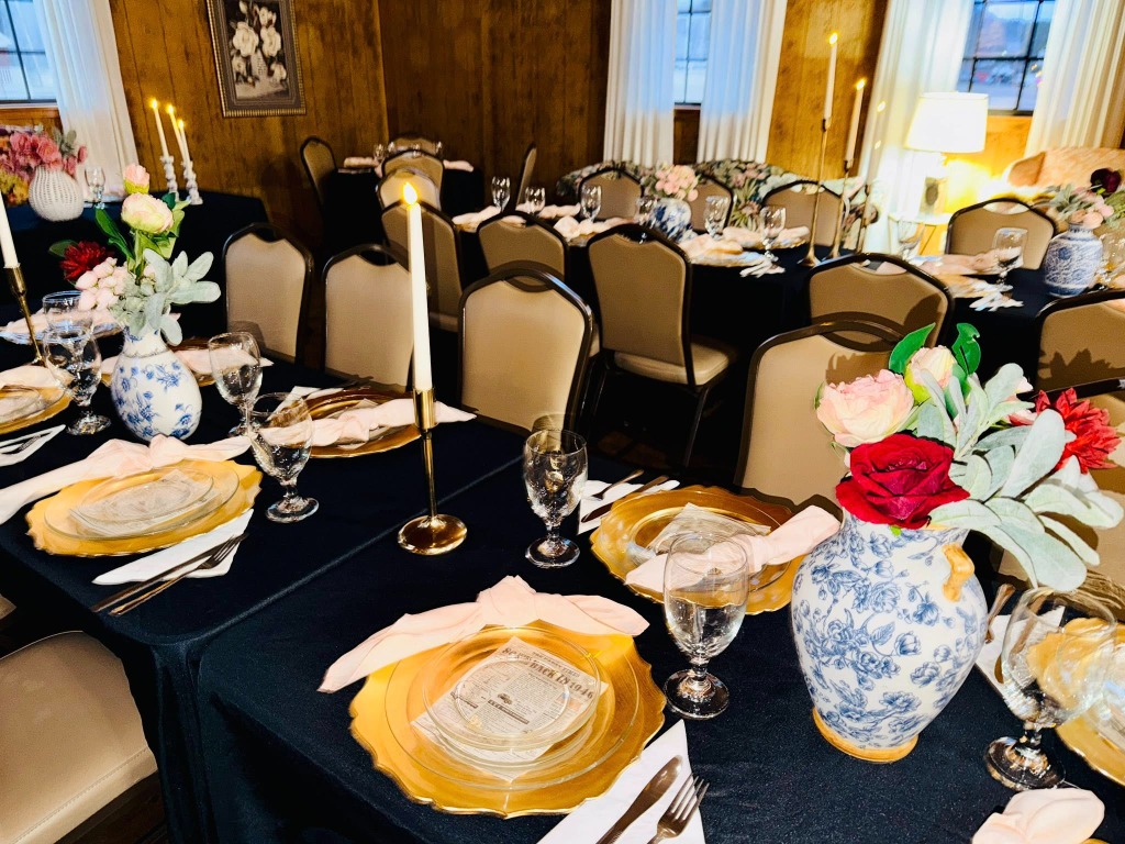 Gold candle holders and framed photo