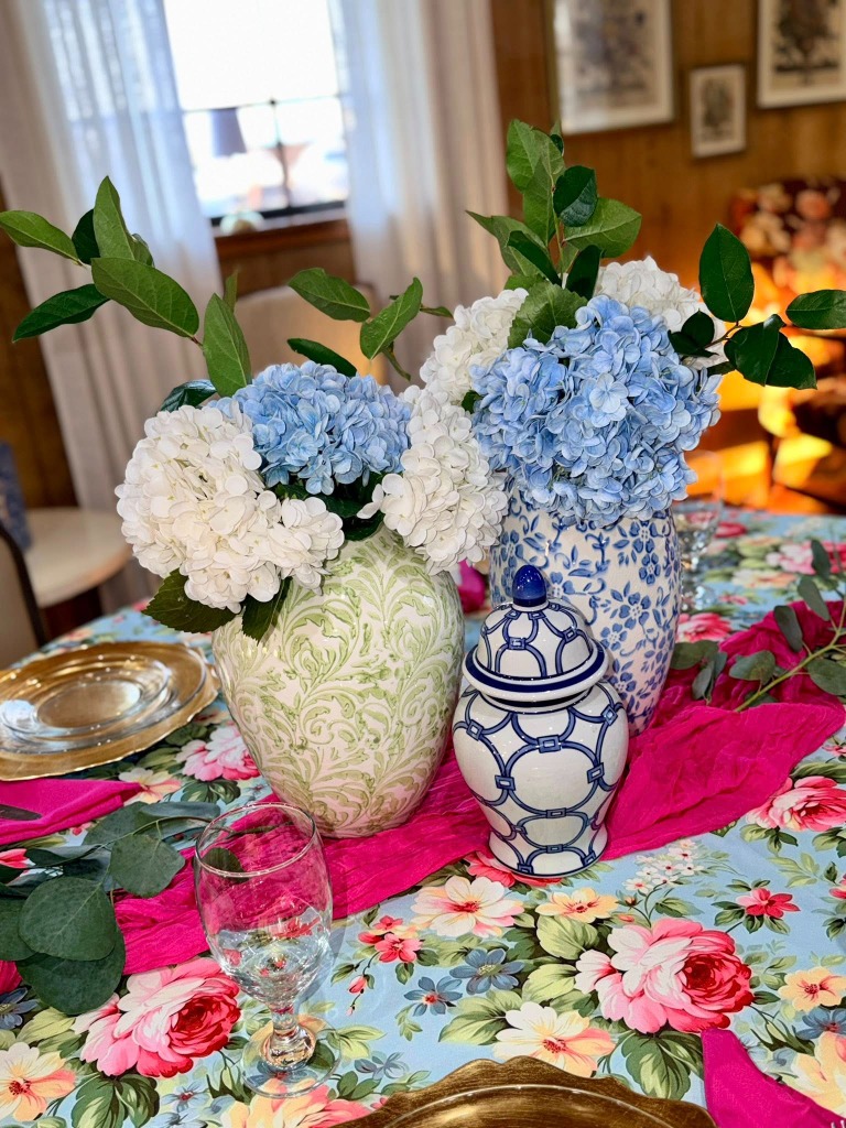 Blue hydrangeas in blue and white vases